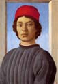 a young man with red hat